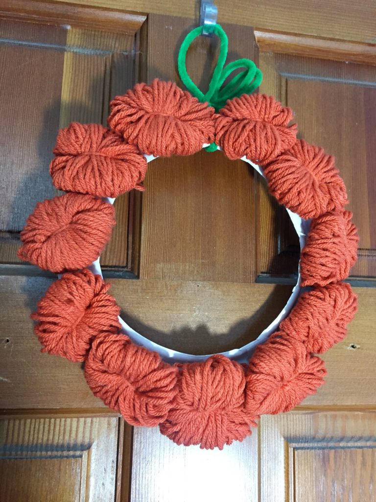 Diy Yarn Pumpkin Wreath by From Under a Palm Tree
