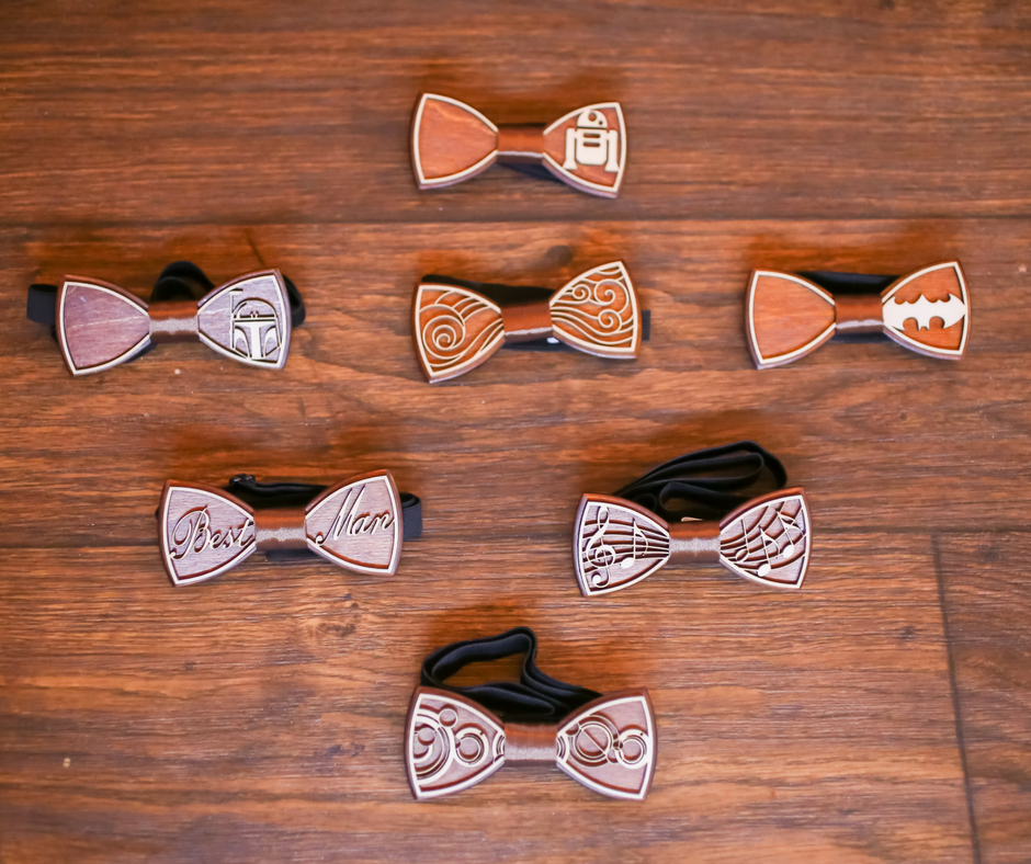 Nerdy Rustic Barn Wedding | Bow ties | Wooden Bow ties | Bride | Sherri Hill| Wedding Dress | Burgundy | Cranberry | pink | gold | woodsy | eucalyptus | wedding invitation | woodland invitation | pine trees | Table Centerpiece | Reception | Wedding | Rustic Wedding | Woodland Wedding | Old McMickey's Farm | The Barn at Crescent Lake | wedding ideas | Centerpieces | Decorations | Wood slices | Nerdy wedding | Rustic | Big Day | Harry Potter | Supernatural | Starwars | Lord of The Rings | Doctor Who | outdoor | barn wedding | Barn bride |