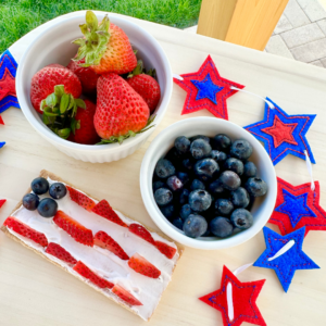 4th of July fruit flag | 4th of july kids snacks | 4th of july kids treat | 4th of july recipe | 4th of july snack | 4th of july treat | american flag fruit pizza | American Flag Graham Cracker Snack | american flag snack | american flag themed foods | american flag themed snacks | easy recipe | easy snack | flag dessert | flag graham crackers | flag snack | flag themed snacks | 4th of july food | fromunderapalmtree | fruit american flag | fruit pizza | graham cracker snack | graham crackers | holiday snacks | kid friendly 4th of july snack | kid friendly recipe | kids recipe | make this with kids | mom blogger | party foods | party snacks | party snacks for kids | pillsbury flag fruit pizza | red white and blue graham cracker snack | red white and blue snacks | red white and blue themed foods | snacks |