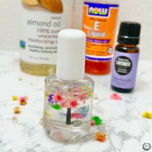 almond oil | beauty | beauty hacks | beauty tips | Best diy cuticle oil | cuticle oil | DIY | DIY beauty hacks | DIY Cuticle Oil | DIY cuticle oil for nail growth | DIY cuticle oil reddit | DIY cuticle oil with castor oil |Diy cuticle oil with essential oils | essential oils | essential oils used for beauty | homemade cuticle oil | Homemade cuticle oil with coconut oil | how to keep my nails healthy | How to make cuticle oil to sell | how to make my own cuticle oil | lavender oil | Edens Garden essential oils | Edens Garden | nail health | oil blends | self care | self care tips | uses for essential oils | vitamin e oil | fromunderapalmtree | lifestyle blog | mom blogger | lavender oil uses | diy beauty recipe | dry cuticles | cuticle care | cuticle care tips | cuticle care ideas